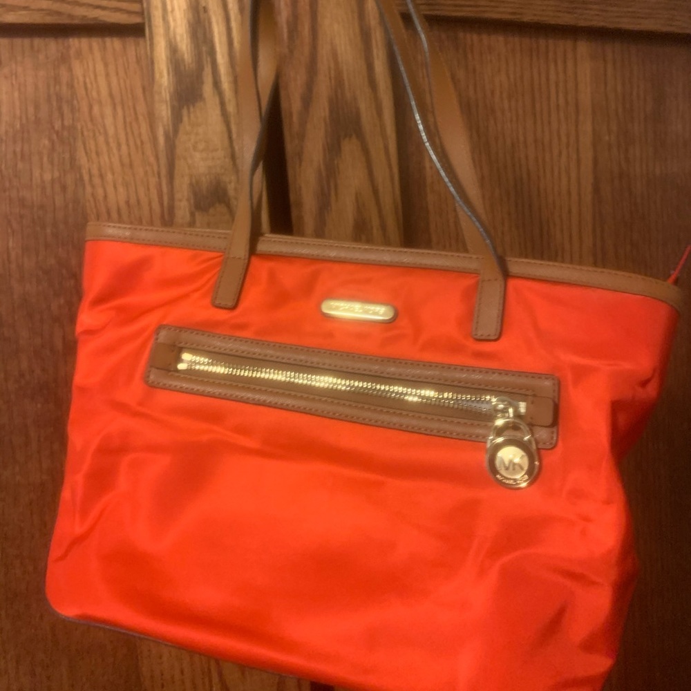 Orange and leather Michael Kors purse